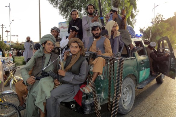 Taliban fighters patrol inside the city of Kandahar province in the south-west of Afghanistan.