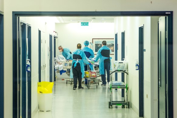 Austin Hospital staff tend to a patient.