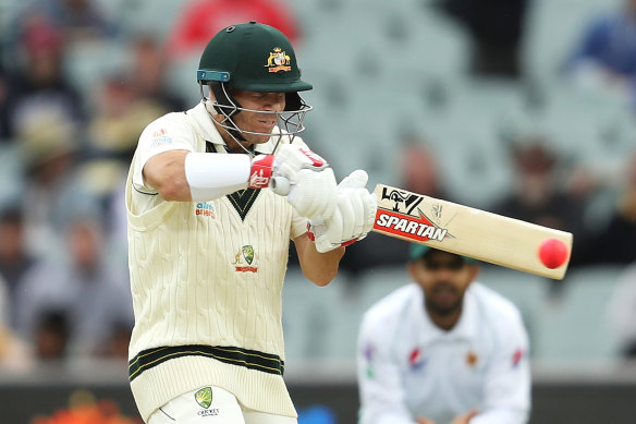 Australia's David Warner punishes Pakistan's short bowling at Adelaide Oval on Friday.