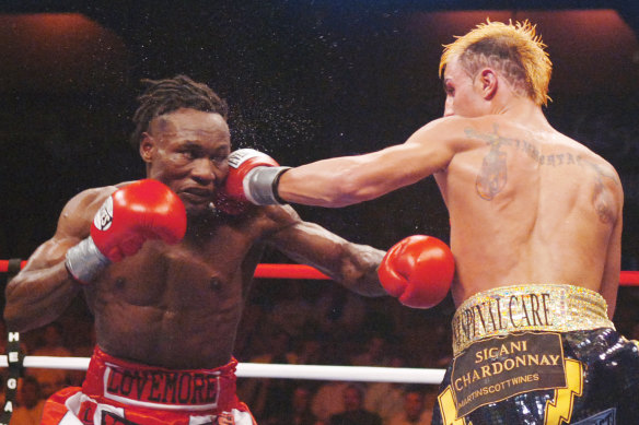 Ndou trades blows with Paulie Malignaggi in 2007.
