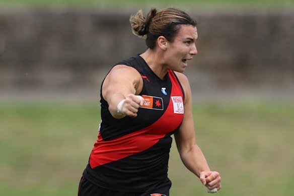 Bonnie Toogood of the Bombers celebrates kicking a goal.