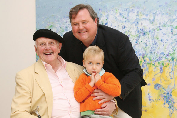 John Olsen with Tim and his son James in front of 'Popping Blue Bottles' at John's exhibition A Salute to Sydney. It was the first show at Tim's new gallery on Jersey Rd, Woollahra.
