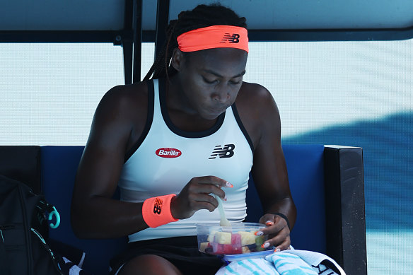 Coco Gauff eating a fruit salad on court at the Australian Open last year.