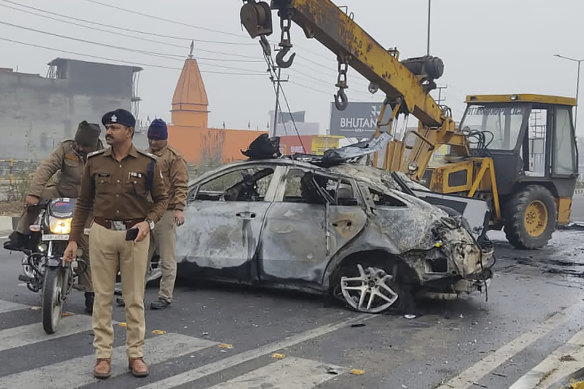 Police officers investigate the scene of Rishabh Pant’s 2022 car accident near Roorkee, in the northern Indian state of Uttarakhand.