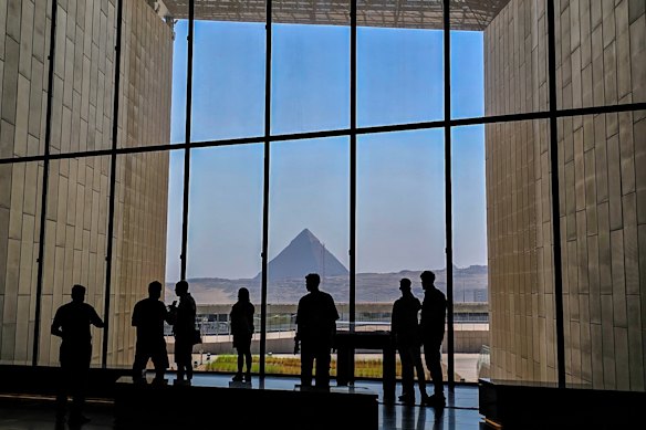 Visitors can see the pyramids from the Grand Egyptian Museum.