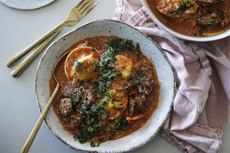 One-pan slurpy creamy tomato and fennel ravioli with optional spicy sausage.
