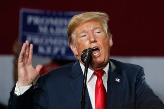 President Donald Trump blamed light bulbs for his orange appearance.