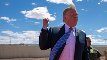 Trump speaks at a new section of the border wall with Mexico on Friday last week.