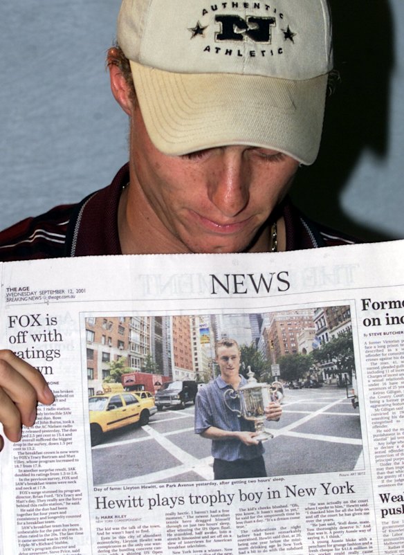 Back in Adelaide, Lleyton Hewitt holds a picture of himself holding his US Open Tennis Trophy taken in New York the previous day.
