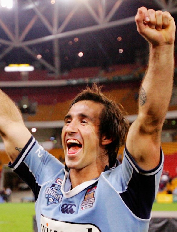 Andrew Johns celebrates his career-defining 2005 Origin series victory for NSW.