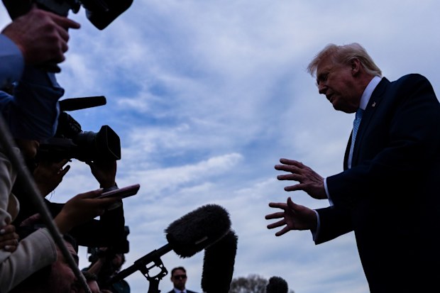 Oil prices dive 14 per cent as Donald Trump backs down on Iran strikes