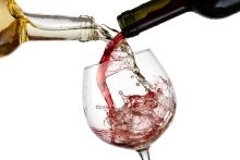 Red and white wine pour in a glass.
Downloaded under the Good Food team account (contact syndication for reuse permissions).