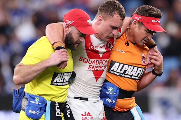 Jacob Liddle is assisted off the field injured