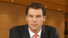Greg Peirce will return to Australia as soon as he can navigate COVID-19 restrictions. 