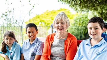 Miriam Meaney, principal of St Canice's Primary School in Katoomba,   with some students.