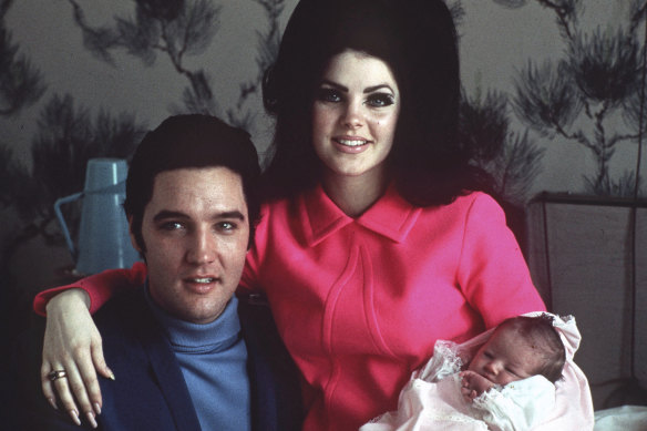 Elvis Presley with wife Priscilla and daughter Lisa Marie in a Memphis hospital four days after she was born in February 1968.