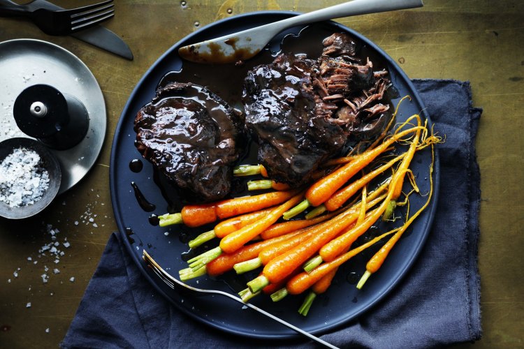 Neil Perry’s braised beef cheeks with baby carrots.