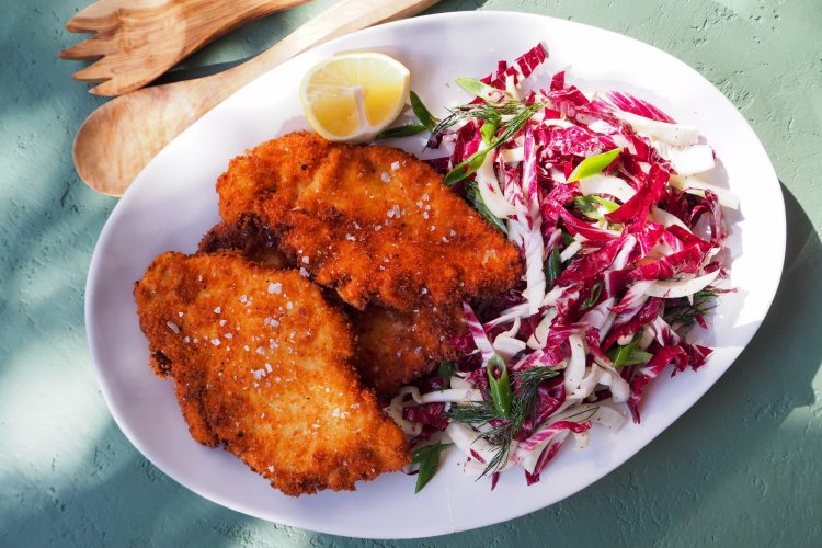 OLYMPUS DIGITAL CAMERA
**EMBARGOED FOR GOOD FOOD, MAY 2022**
VanessaÂ GordonÂ recipe: Chicken schnitzels with radicchio and fennel slaw.
Pic credit:Â VanessaÂ Gordon