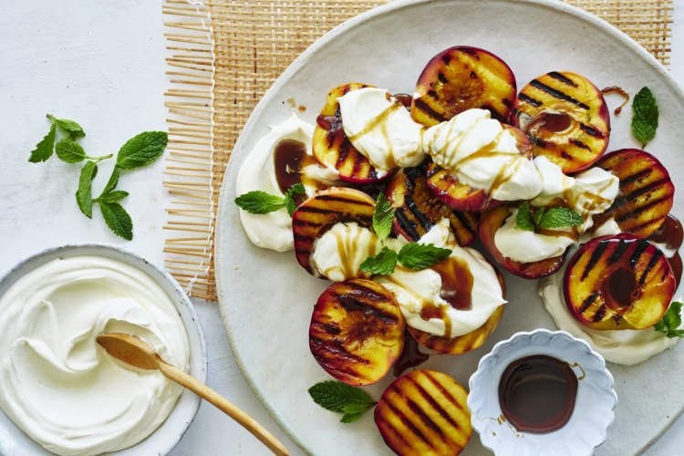 ***EMBARGOED FOR SUNDAY LIFE, JANUARY 29/23 ISSUE***
Adam Liaw recipe: Grilled peaches with coconut yoghurt and brown sugar
Photography by William Meppem (photographer on contract, no restrictions)
