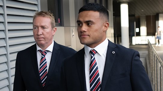 Roosters forward Spencer Leniu enters the NRL judiciary hearing on Monday night with coach Trent Robinson.