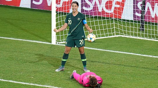 Sam Kerr celebrates her fourth goal after swooping on an error from Jamaica's goalkeeper.