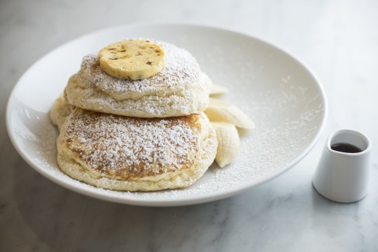 Ricotta hotcakes with honeycomb butter.