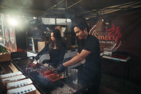 Joshua Alfomso, and Ahrizel Ocampo grilling Filipino skewers at Smoky Cravings original Lakemba stall.