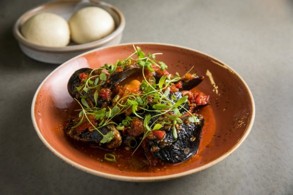 Mussels with house made chilli sauce and steamed bau (buns)