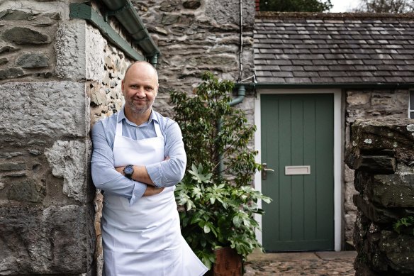 Chef Simon Rogan at his flagship restaurant L'Enclume in the village of Cartmel, known for its sustainable approach and use of hyper-seasonal produce.
