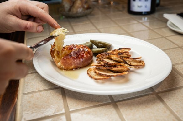 At Grana, shoppers can sit down for snacks such as baked brie.