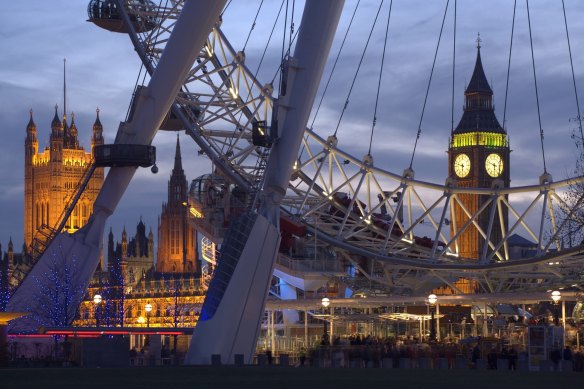 The London Eye with Houses of Parliament in the background.