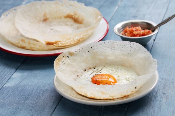 Sri Lankan egg hoppers with sambol.