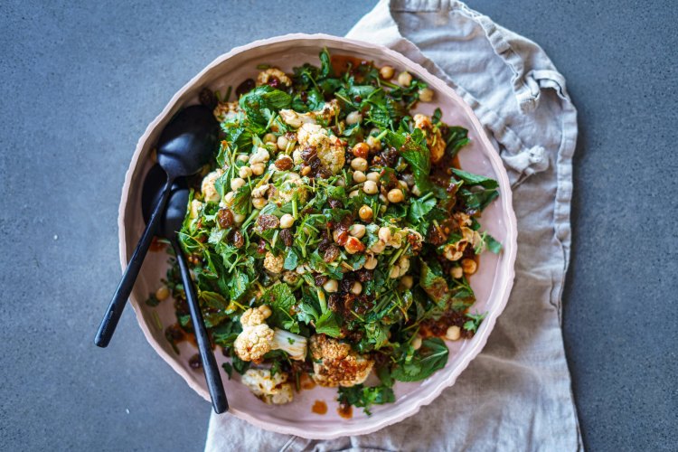 Roasted cauliflower, chickpea and herb salad withÂ harissaÂ and honey dressing. KatrinaÂ Meynink Christmas salad recipes for Good Food November/December 2020. Please creditÂ KatrinaÂ Meynink. Good Food use only.