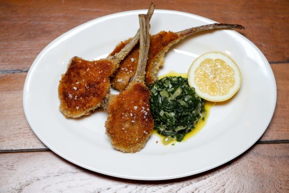 Crumbed lamb cutlets with silverbeet. 