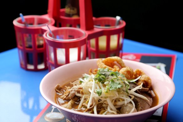 Thai street food in a central business district parking lot: Soi 38 beef boat noodles.