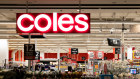 Coles says significant challenges for the supermarket chain are easing as vaccination rates climb.