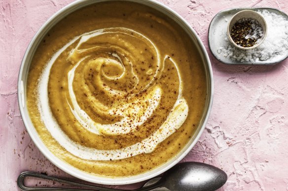 Adam Liaw’s parsnip and onion soup, swirled with cream.