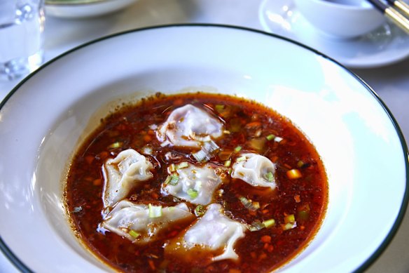 San xian dumplings in Sichuan chilli oil at Grape Garden Beijing Cuisine.