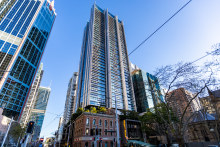 The three-bedroom, three-level penthouse with internal lift in the Foster-designed Lumiere building at 5408/101 Bathurst Street in central Sydney sold by private treaty for $7.75 million.