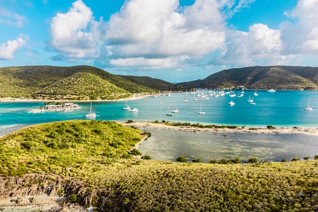 Aerial view of Catamaran in front of beach and famous sailing destination stock photo