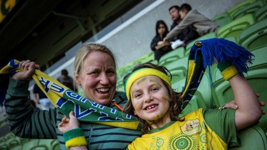 8-year-old Lenny and his mother Claudia Daymond watching the Matildas at AAMI Park.