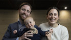 Financial adviser Robert Devlin with wife Eloise and baby Edward.