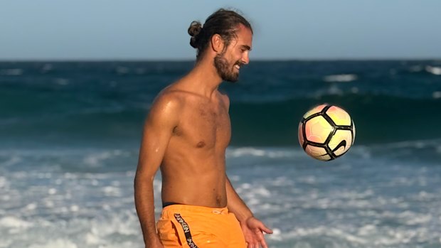 Dan Elkayam doing what he loved: playing football.