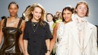 Ganni creative director Ditte Reffstrup walks the runway with models at Paris Fashion Week in September.