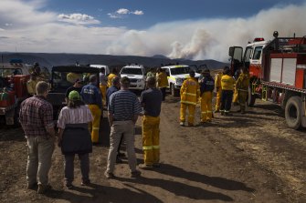 RFS crews watch from High Range on December 1 as the Green Wattle Creek fire began its surge towards Lake Burragorang, Sydney's main reservoir behind Warragamba dam.