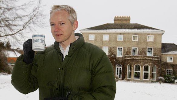 Julian Assange takes a drink during a press conference at the home of Frontline Club founding member Vaughan Smith in England in 2010. The leaks embarrassed Washington.