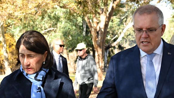 Awkward: Prime Minister Scott Morrison and former premier Gladys Berejiklian. 