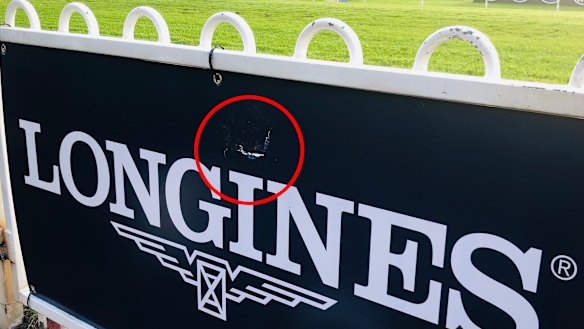 Dotting the i's ... the smashed Longines sign caused by Winx at Rosehill