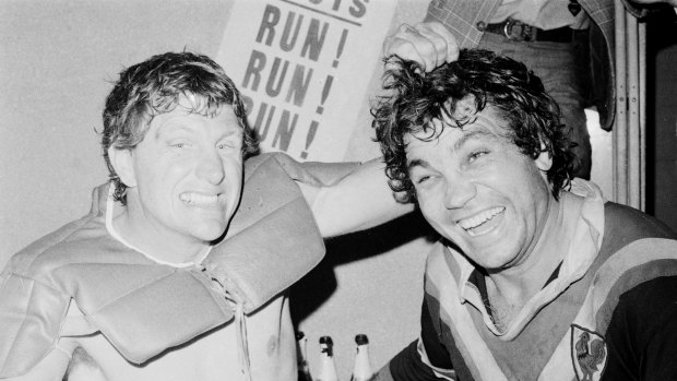 Eastern Suburbs stars Ron Coote (left) and Arthur Beetson share the joys of victory in the dressing room after the 1975 grand final between Easts and St George.
