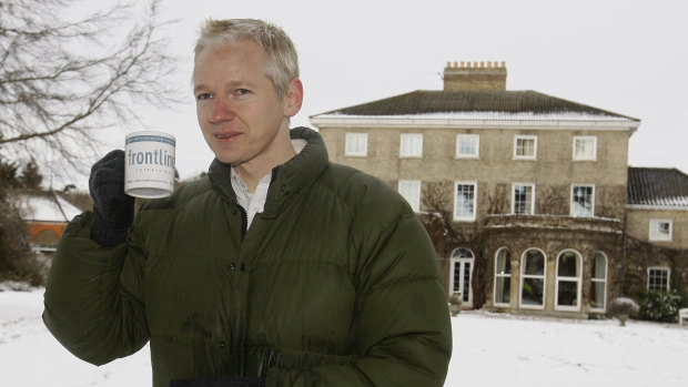 Julian Assange takes a drink during a press conference at the home of Frontline Club founding member Vaughan Smith in England in 2010. The leaks embarrassed Washington.